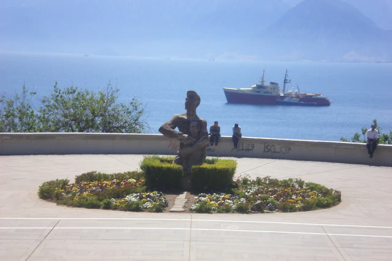 The Worker and Son monument beside the coastal overlook in Karaalioglu Park