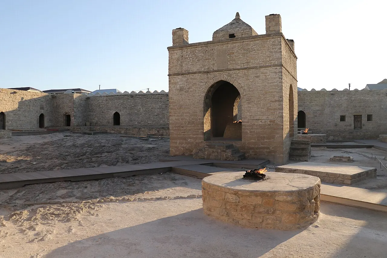The stone courtyard and central shrine at the Ateshgah Fire Temple