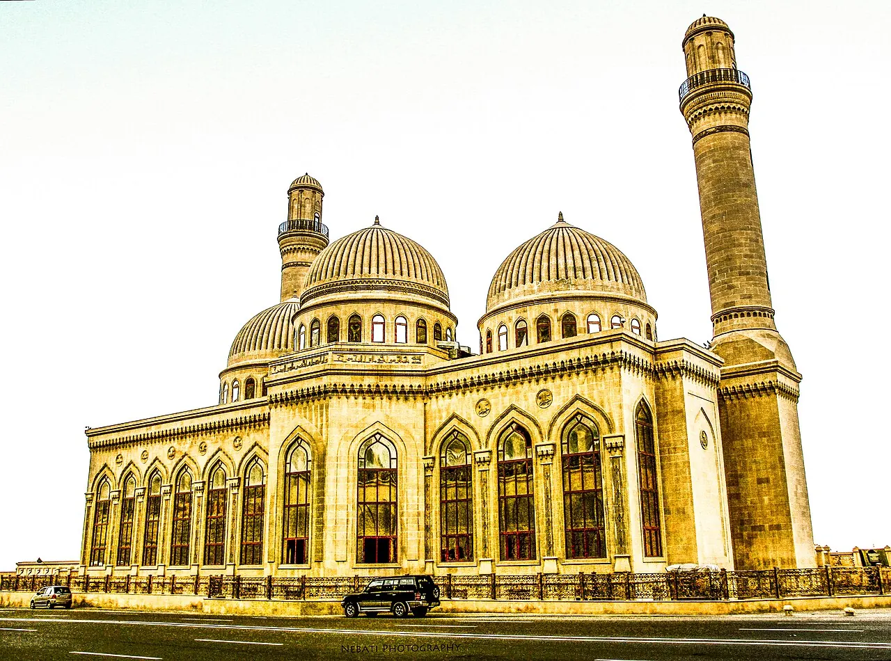 The domes, minaret and decorated facade of Bibi-Heybat Mosque