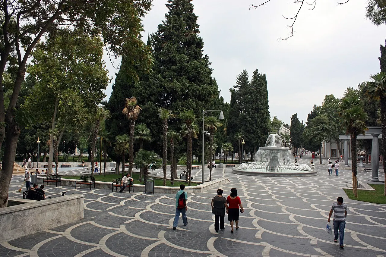 Pedestrian paving, trees and a working fountain in Fountains Square