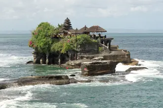 Tanah Lot temple on its rocky coastal outcrop above the sea