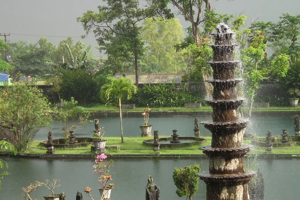 Sculpted fountain and landscaped pools at Tirta Gangga water palace