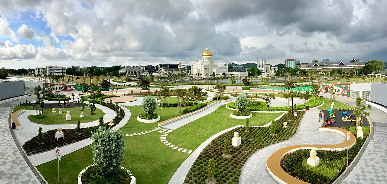 Curving garden paths and lawns in Taman Mahkota Jubli Emas beside the river