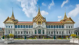 Royal palace buildings and ornate roofs within Bangkok's Grand Palace complex