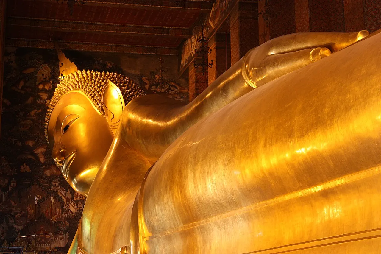 The golden reclining Buddha inside Wat Pho in Bangkok