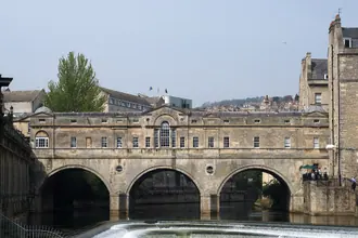 Pulteney Bridge and its stone arches across the River Avon