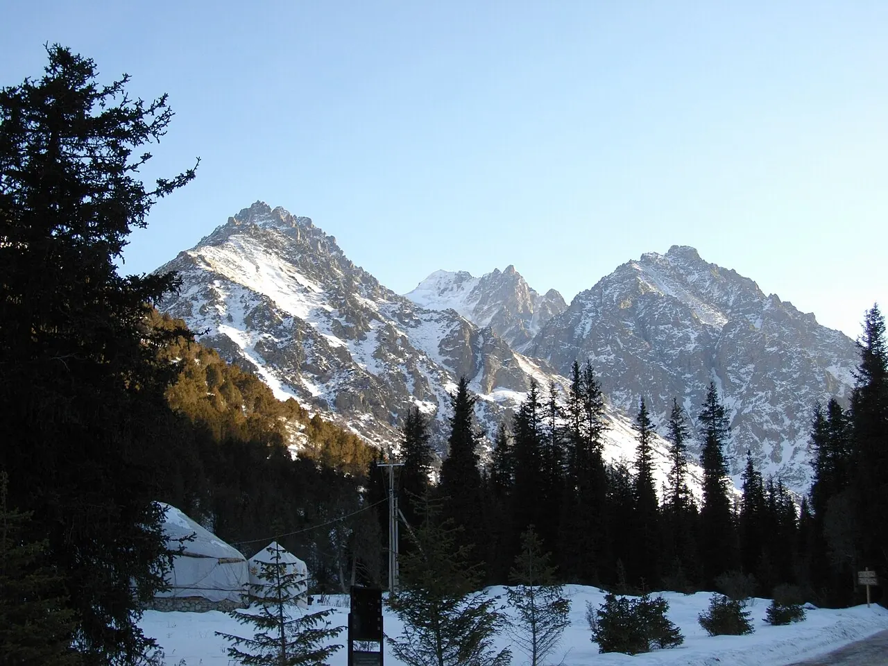 A mountain valley, conifer forest and rocky peaks in Ala-Archa National Park