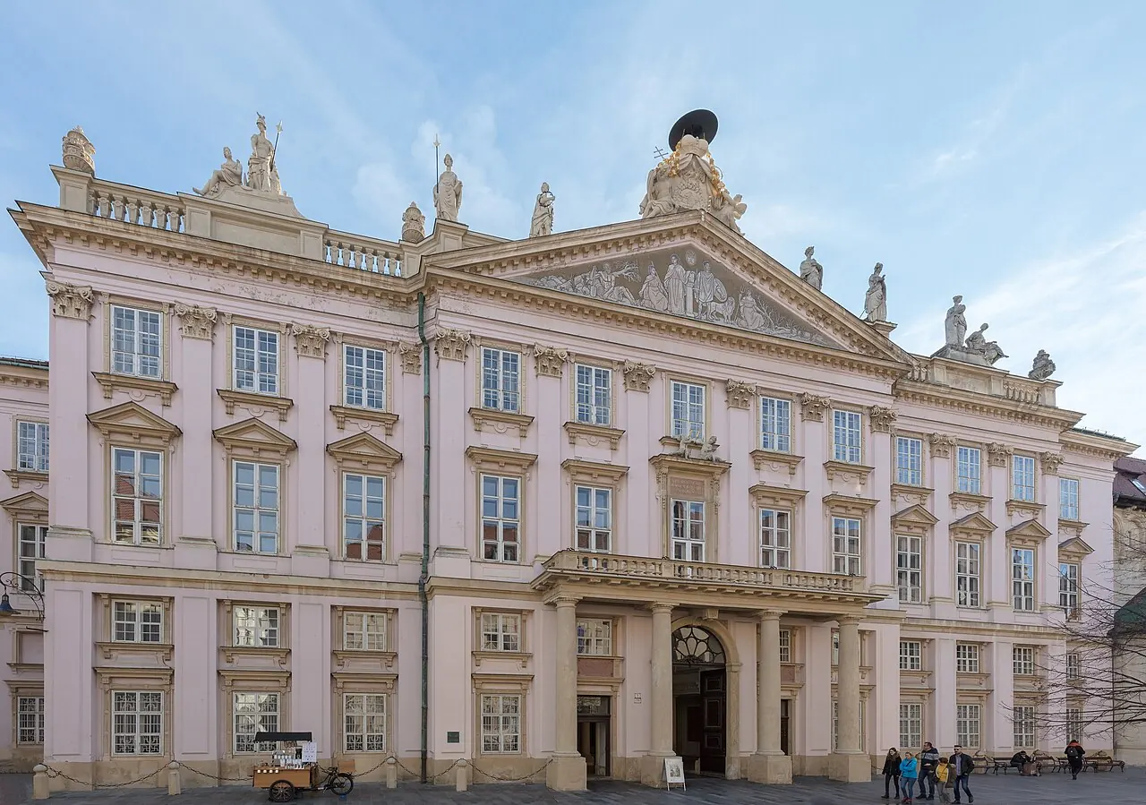 The pale pink facade of the Primate's Palace in Bratislava