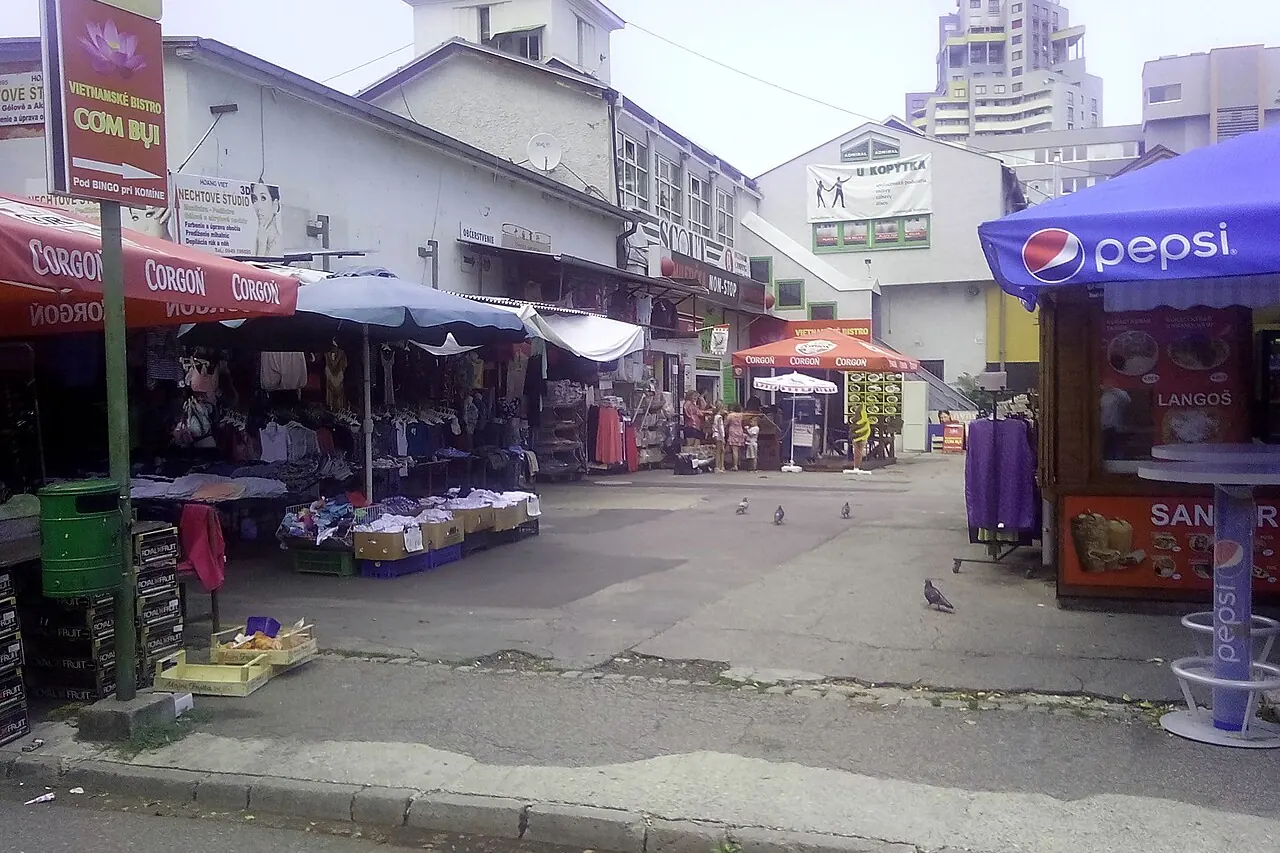 Stalls and small food counters at Mileticova Market in Bratislava