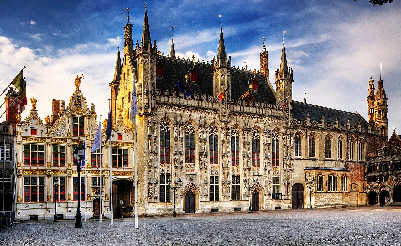 The ornate Gothic facade of Bruges City Hall on Burg square