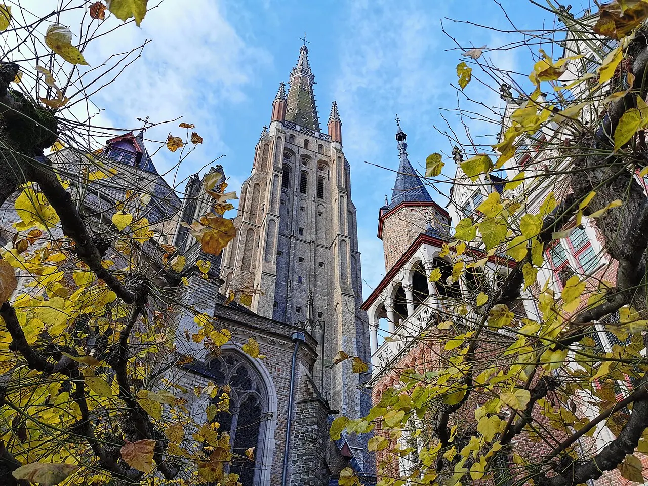 The brick Church of Our Lady in Bruges photographed from its surrounding streets
