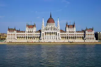 Hungarian Parliament beside the Danube, with its central dome and riverside facade