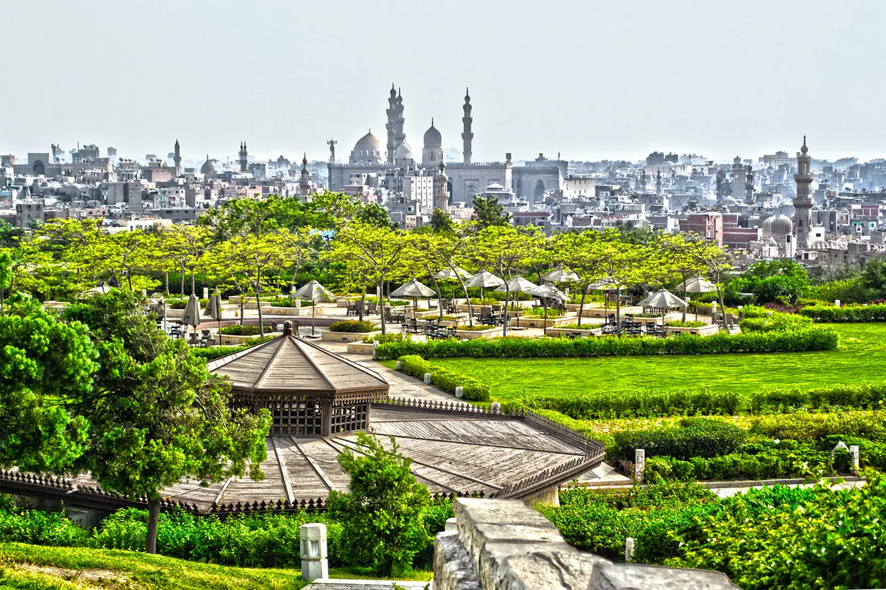 Landscaped gardens and the Cairo skyline at Al-Azhar Park