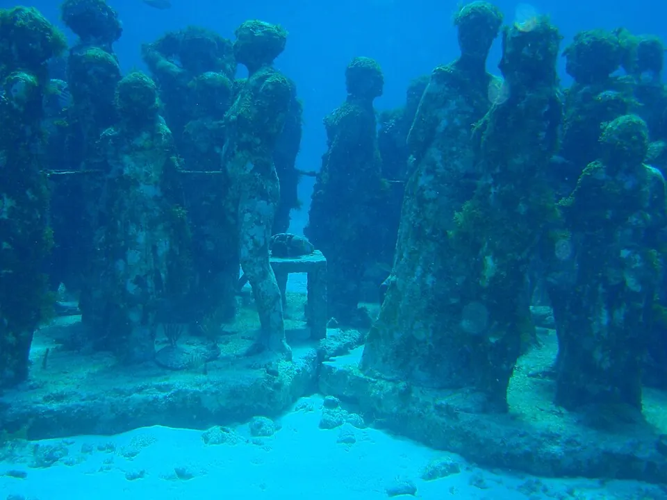 Human-figure sculptures underwater at the Cancun Underwater Museum