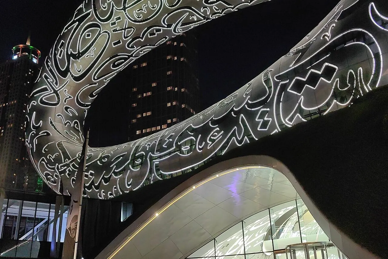 The torus-shaped Museum of the Future with Arabic calligraphy on its exterior
