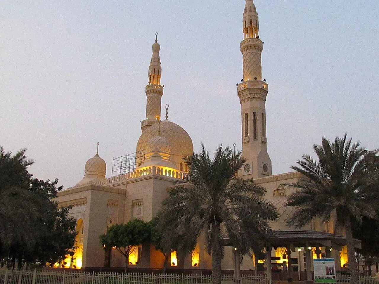 Jumeirah Mosque's pale stone facade, dome and twin minarets