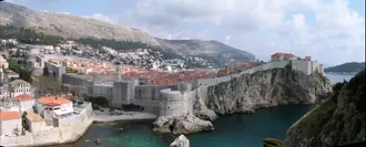 Dubrovnik city walls following the rocky Adriatic coast below the old town
