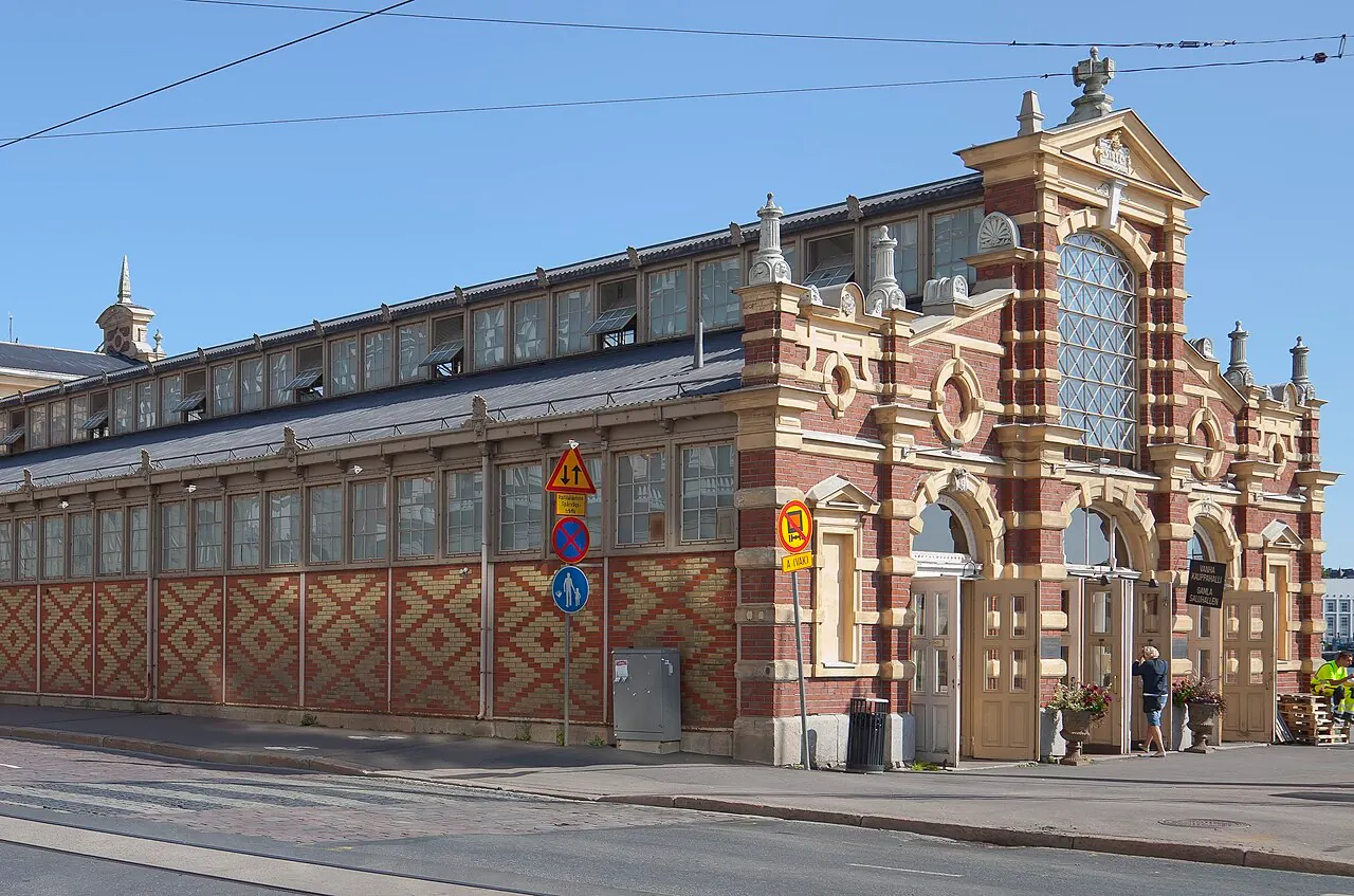 The brick facade and entrances of Helsinki's Old Market Hall