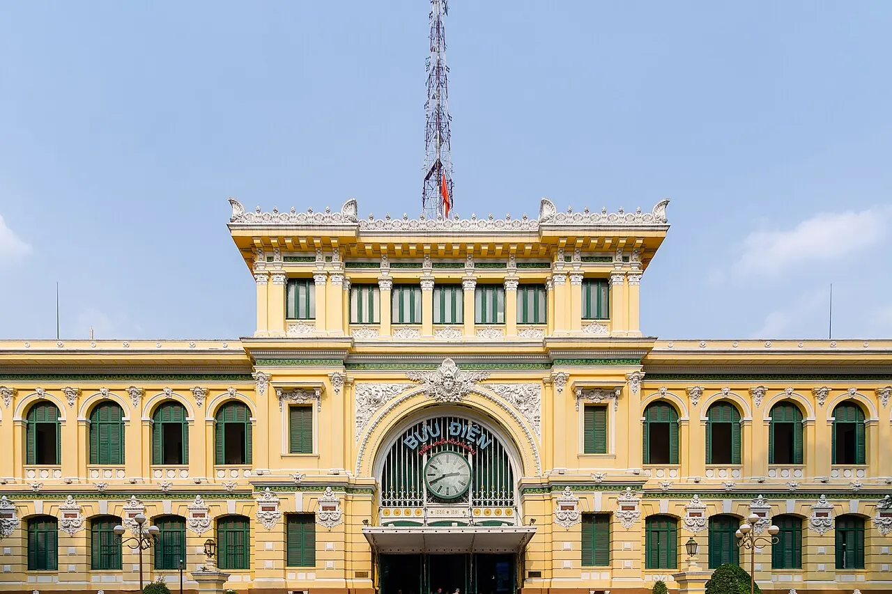 The yellow facade and central entrance of Saigon Central Post Office