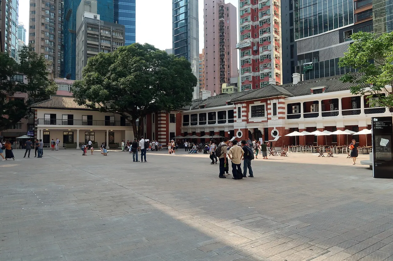 Tai Kwun's parade ground surrounded by restored historic buildings