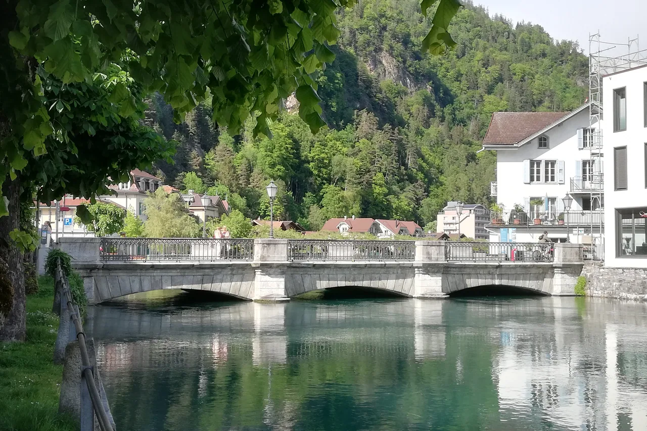 The Schaal bridge and riverside buildings in Unterseen