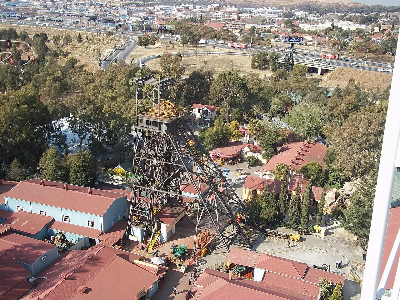 Mine headgear and theme-park buildings at Gold Reef City viewed from the wheel