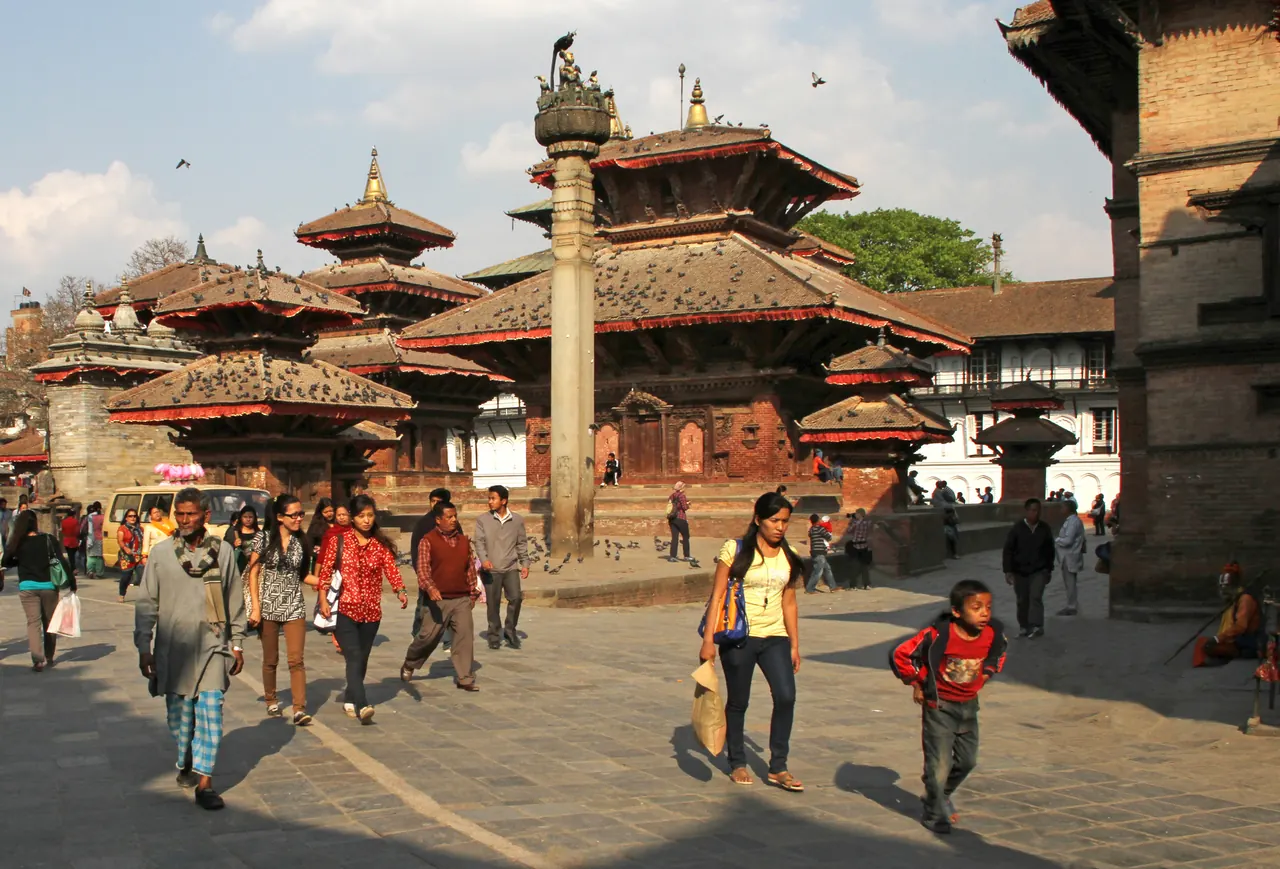 Pagoda temples and a stone column in Kathmandu Durbar Square