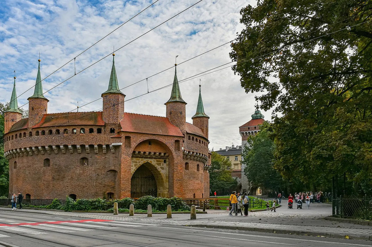 Krakow's circular brick Barbican beside Planty and St Florian's Gate