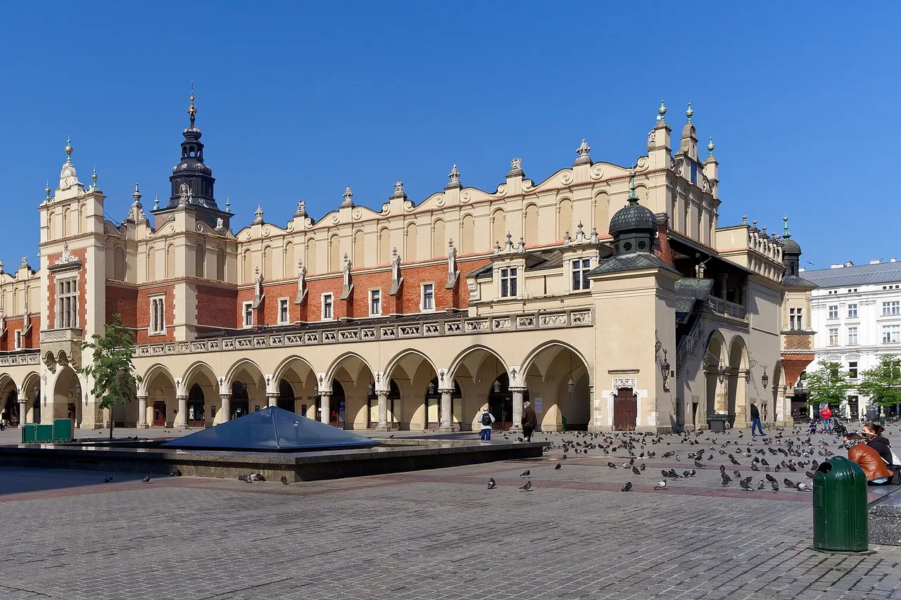 The Cloth Hall's long arcade and upper facade in Krakow's Main Market Square