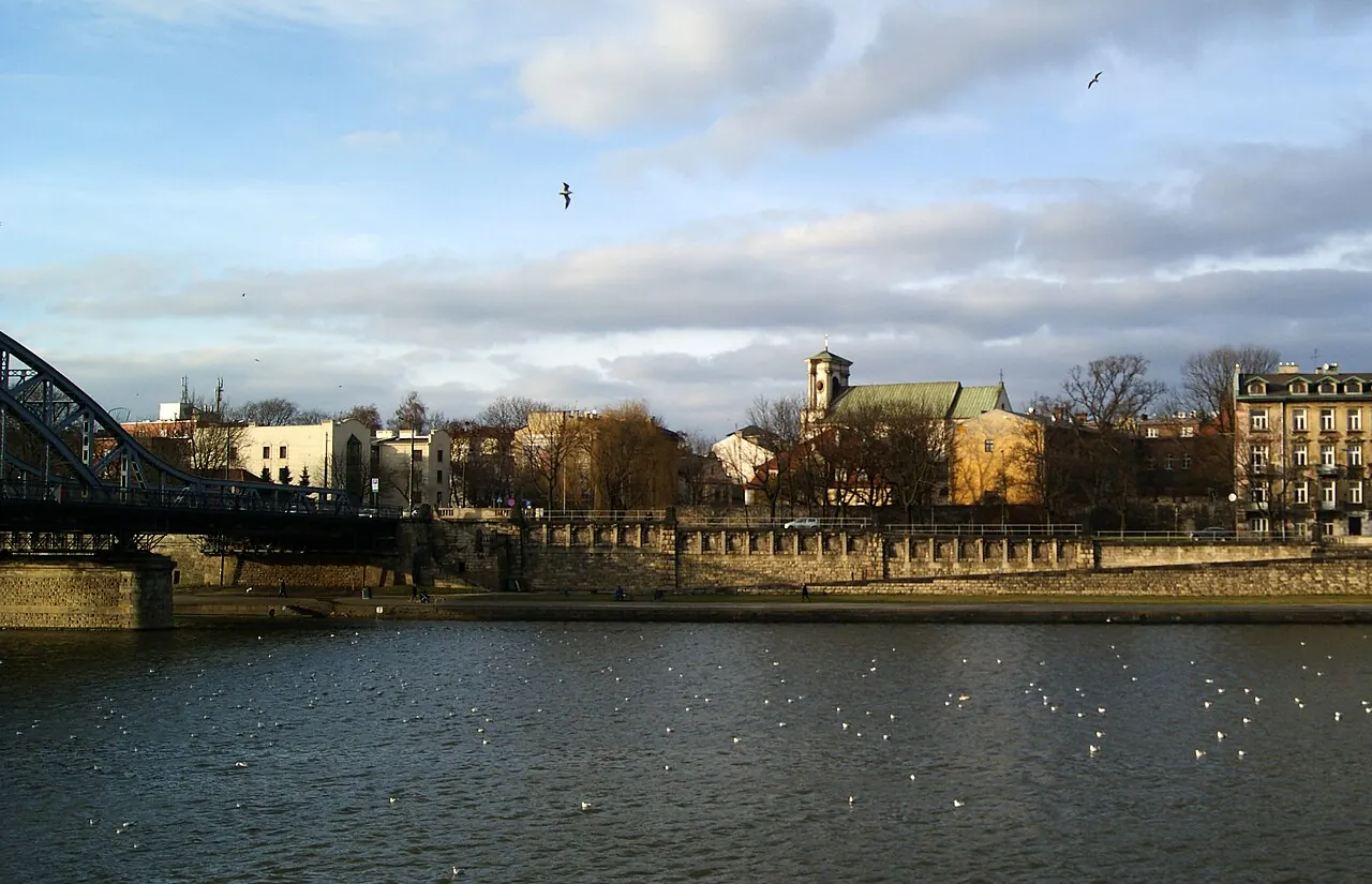 The rooftops and church towers of Krakow's Kazimierz district seen from the south