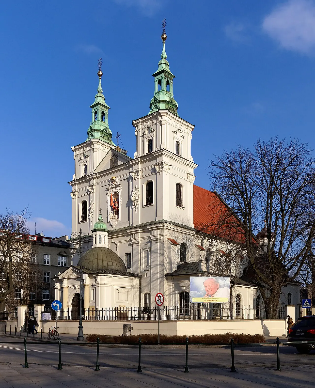 The twin towers and street-side facade of St Florian's Church in Krakow's Kleparz