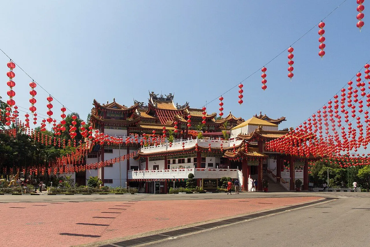 Thean Hou Temple's layered roofs, red columns and courtyard in Kuala Lumpur