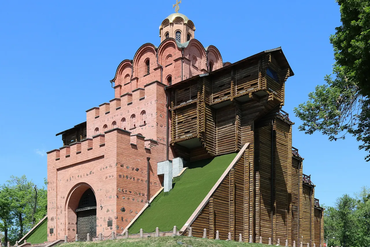 The timber-covered reconstruction of Kyiv's Golden Gate and its surrounding trees