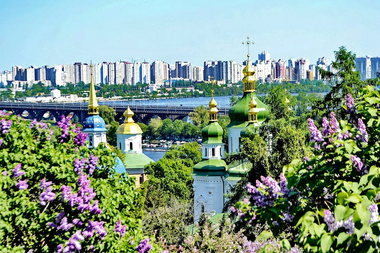 Flowering lilacs in Hryshko Botanical Garden above Vydubychi Monastery and the Dnipro in Kyiv
