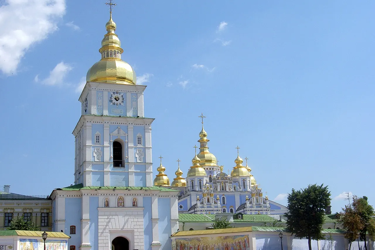 The blue walls and gilded domes of Saint Michael's Golden-Domed Monastery in Kyiv