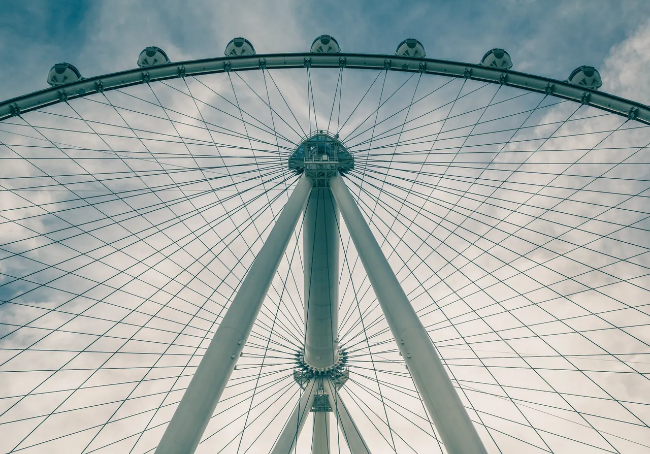 The High Roller observation wheel beside Las Vegas resort buildings