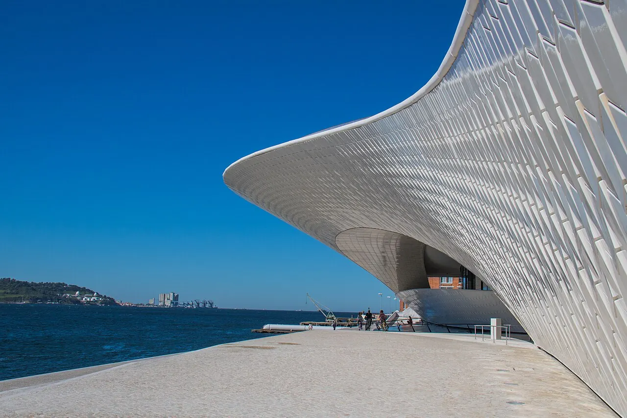 MAAT's curved white building beside Lisbon's Tagus waterfront