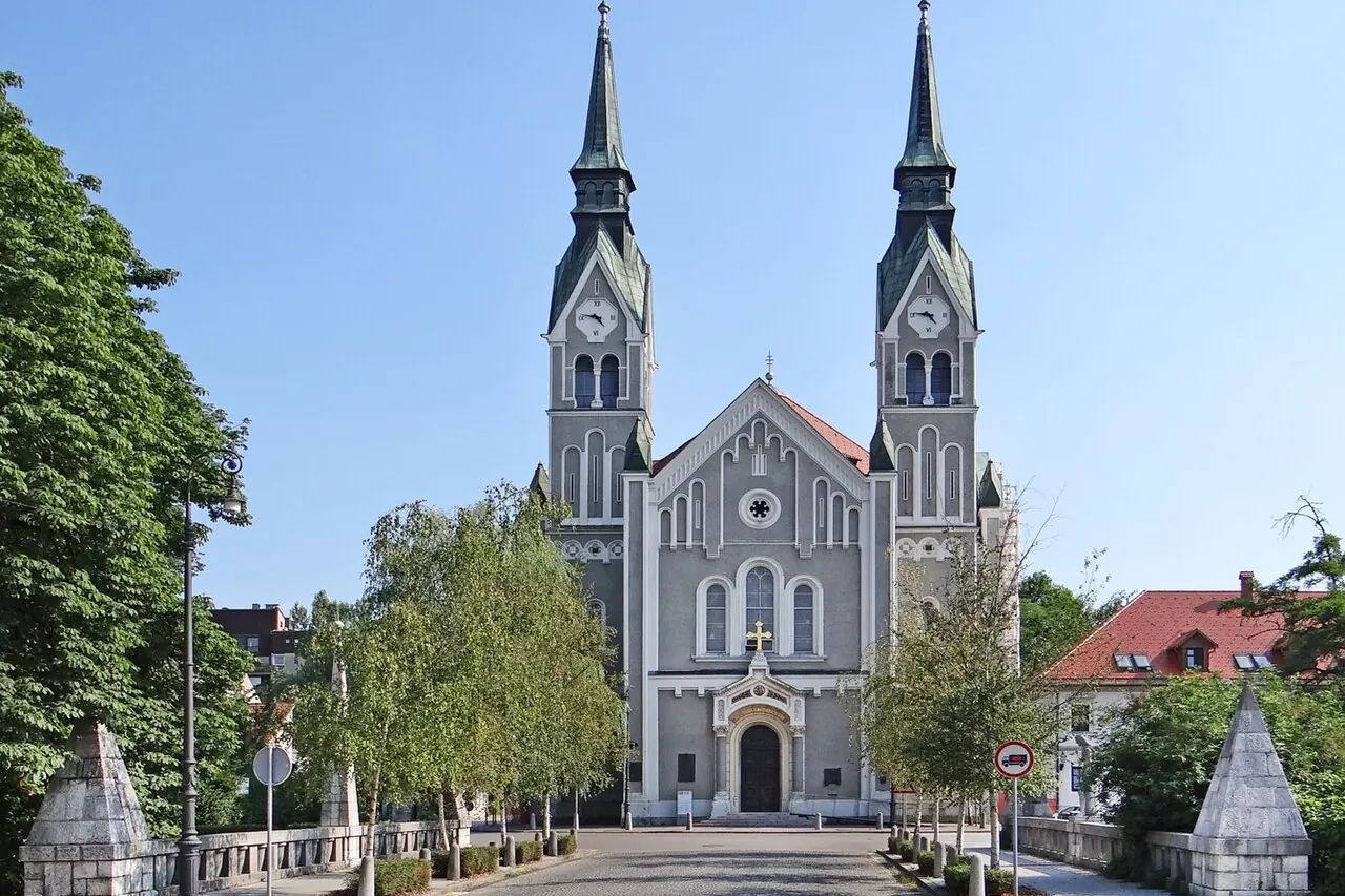 Trnovo Bridge facing the twin towers of Trnovo Church in Ljubljana