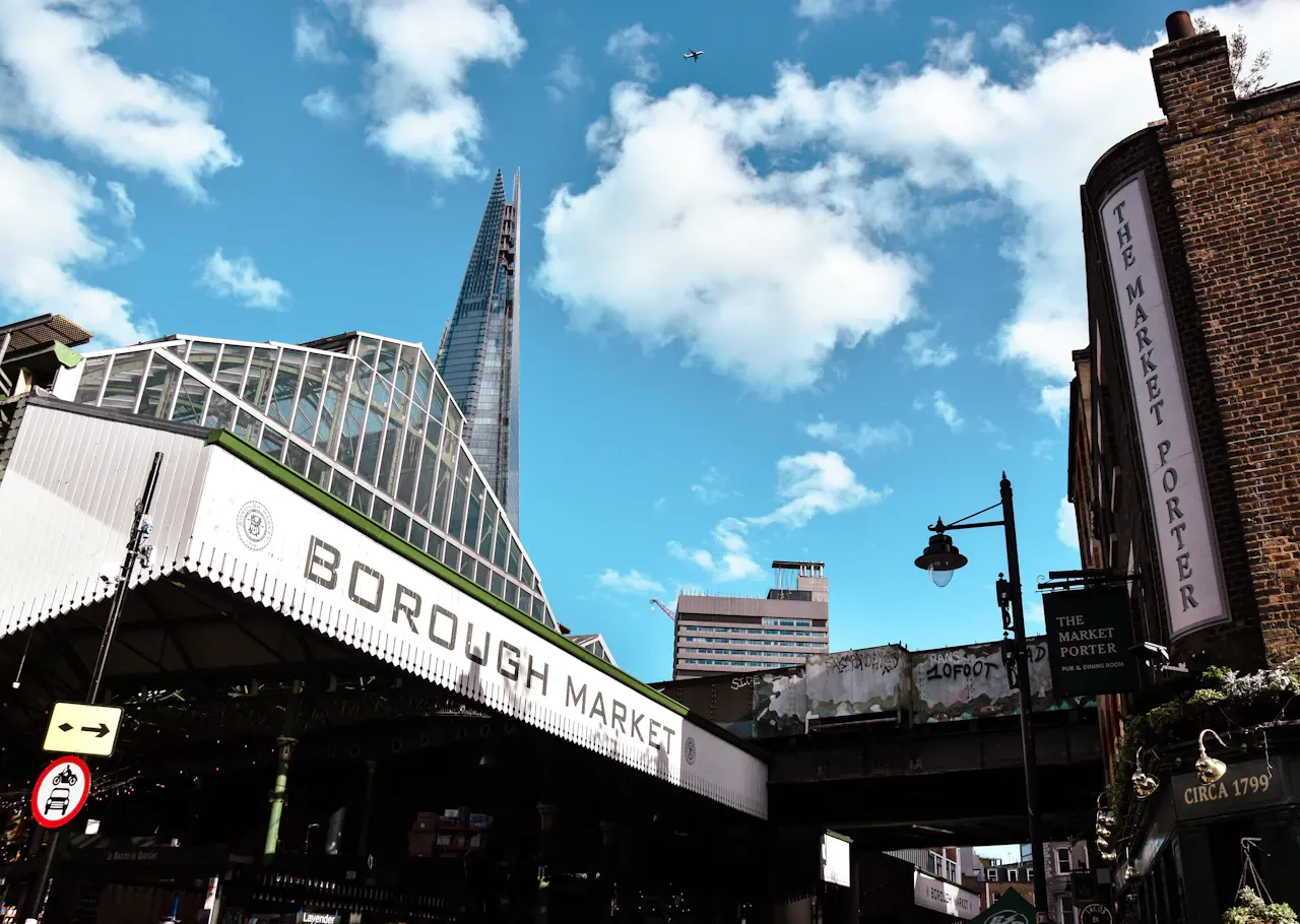 Borough Market entrance with the Shard behind it and the Market Porter pub beside it