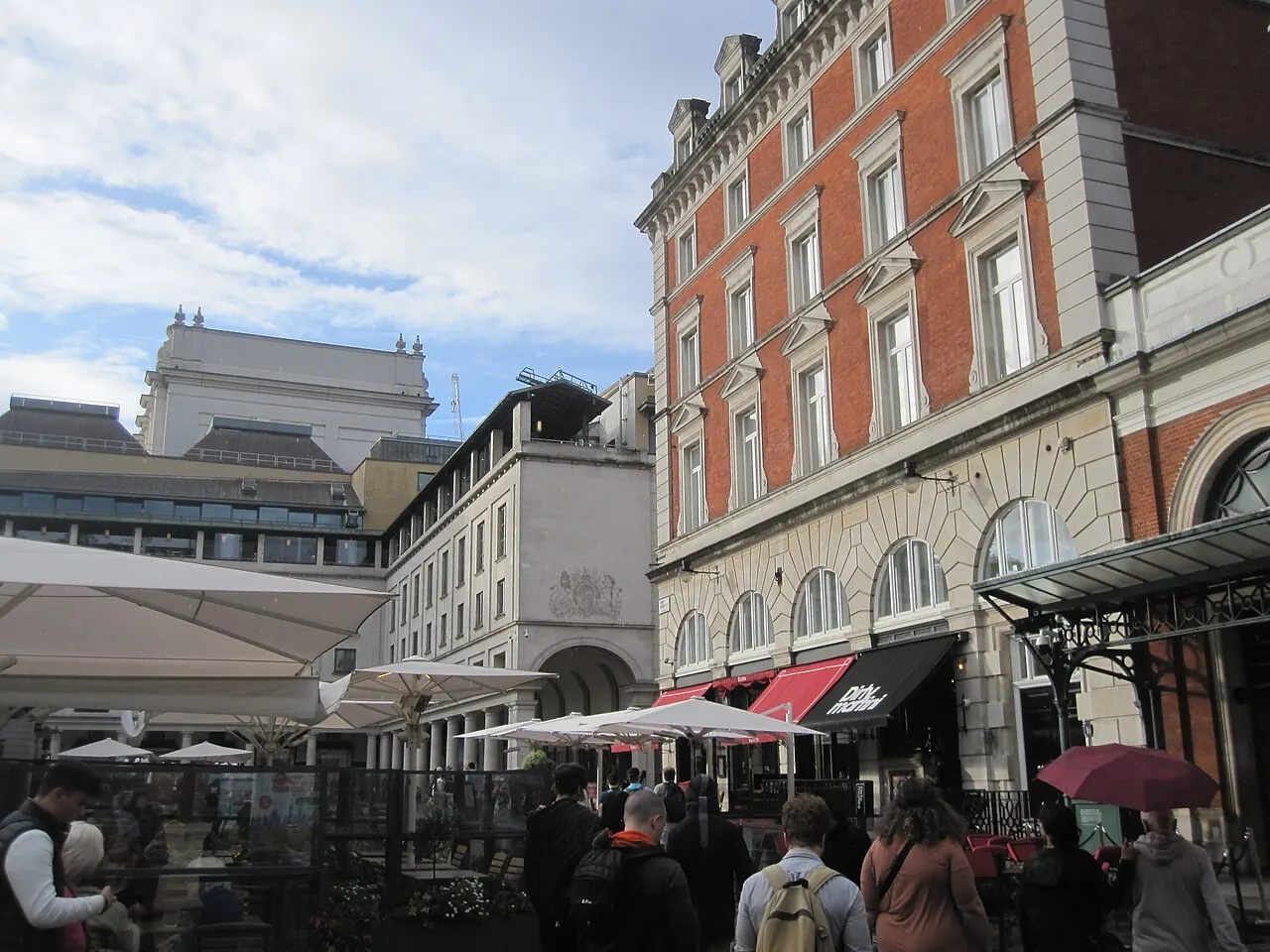 Visitors and cafe terraces around Covent Garden Piazza