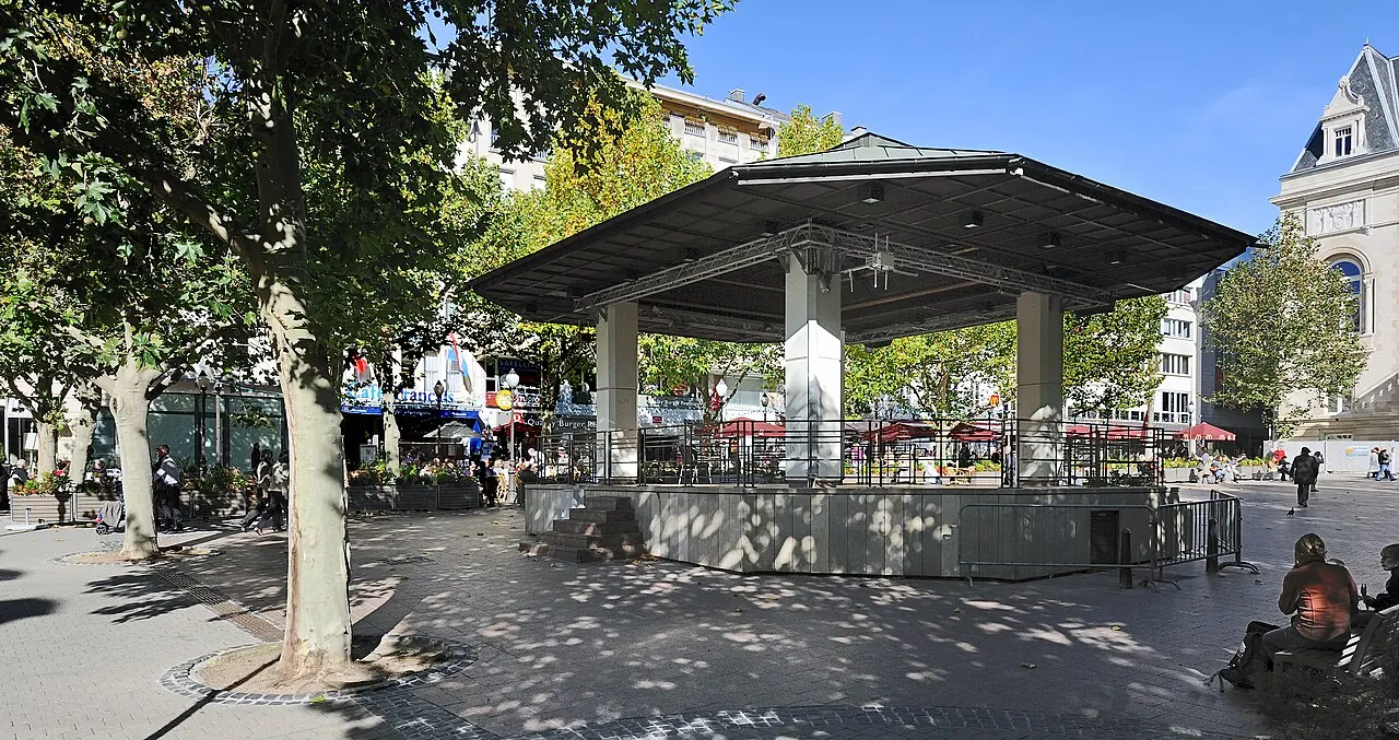 Tree-shaded terraces and pavilion on Place d’Armes in Luxembourg City