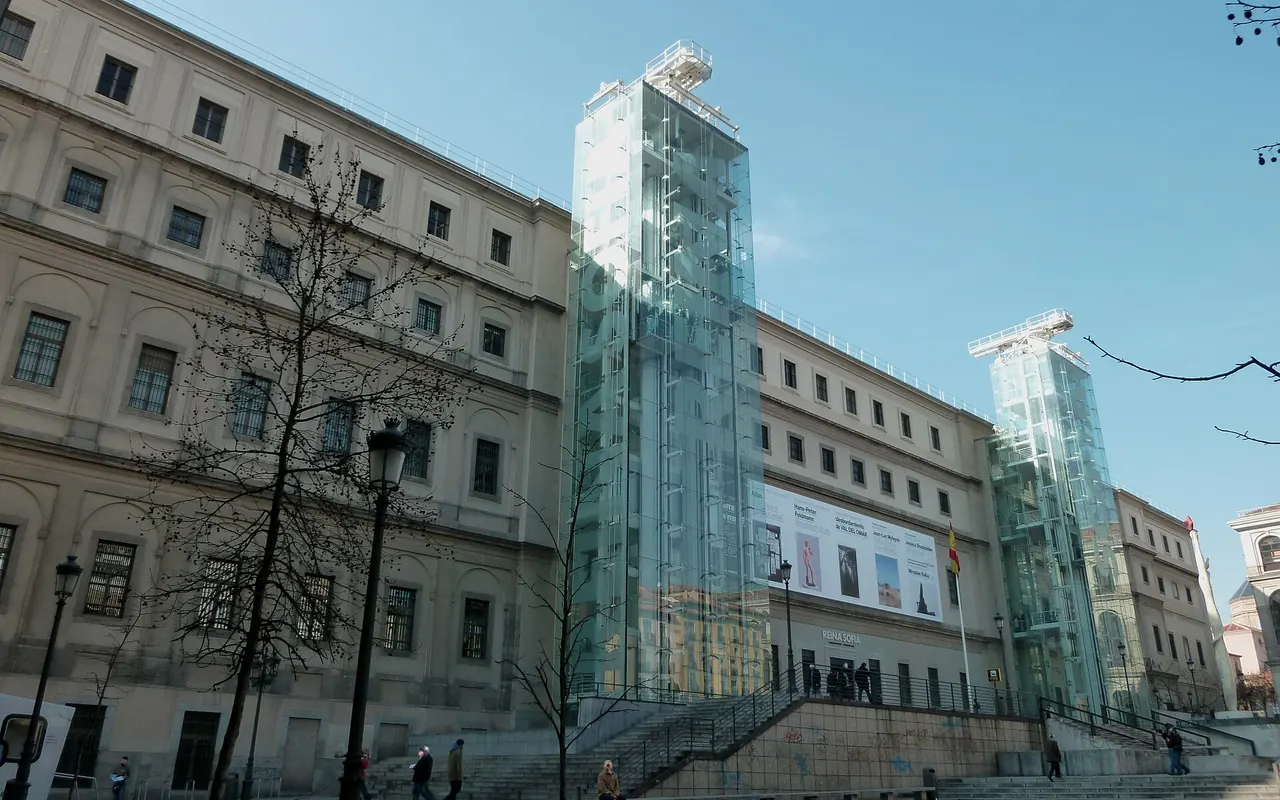 The Reina Sofia Museum's historic building with its exterior glass lifts