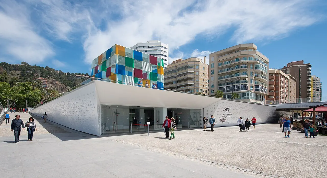 The colourful cube of Centre Pompidou Malaga beside the port