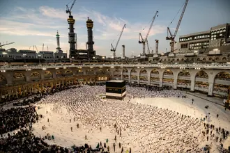 The Grand Mosque courtyard and Kaaba surrounded by worshippers in 2022