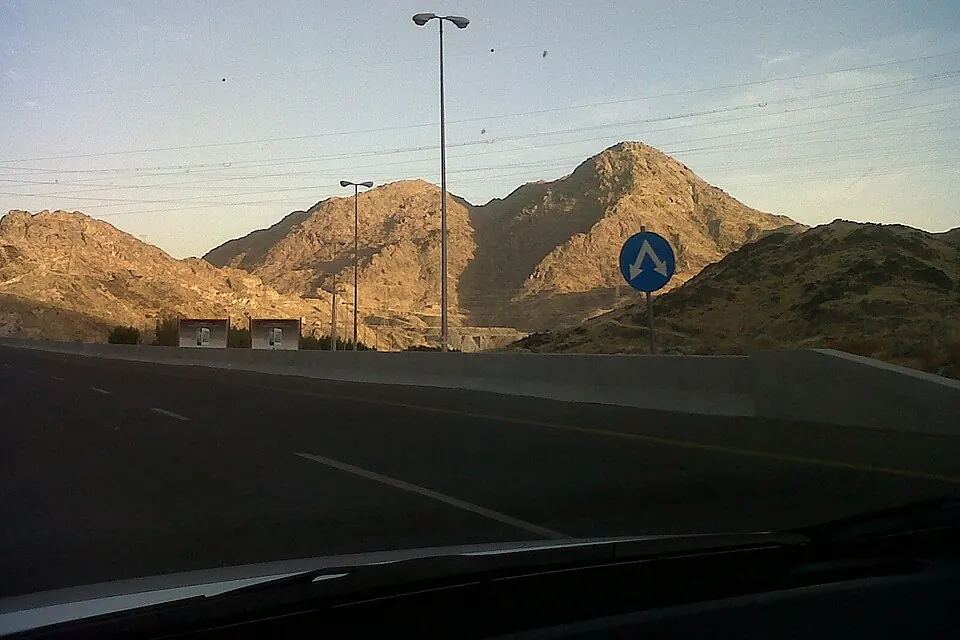 The rocky Jabal Thawr mountain seen beyond a road in southern Mecca