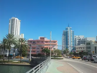 The streets, palms and accommodation buildings of Mid-Beach in Miami Beach