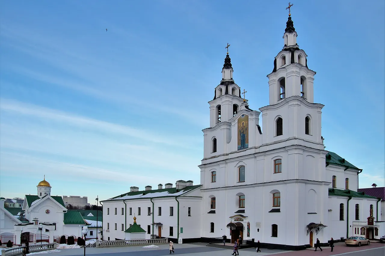 White twin-towered Holy Spirit Cathedral above the streets of central Minsk