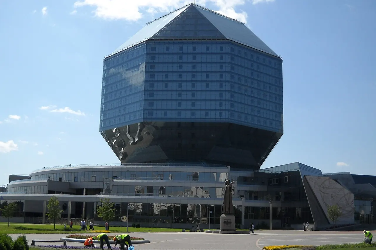 Faceted glass National Library of Belarus rising above its landscaped surroundings