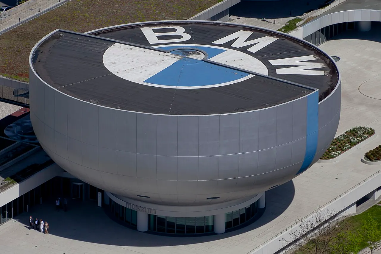 The bowl-shaped BMW Museum beside the company's tower in Munich