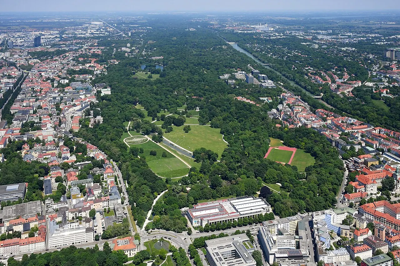 An aerial view of the lawns, trees and waterways in Munich's English Garden